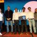Colaboradores ganadores del Día de la Innovación de Multi X junto a ejecutivos en Puerto Varas.