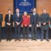 Representantes de SalmonChile, Ministerio de Justicia y Gendarmería durante la firma del memorándum de reinserción en Puerto Montt.