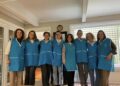 Representantes de Badinotti, Multi X y Fundación Mater Filius durante la entrega del aporte social en Puerto Varas.